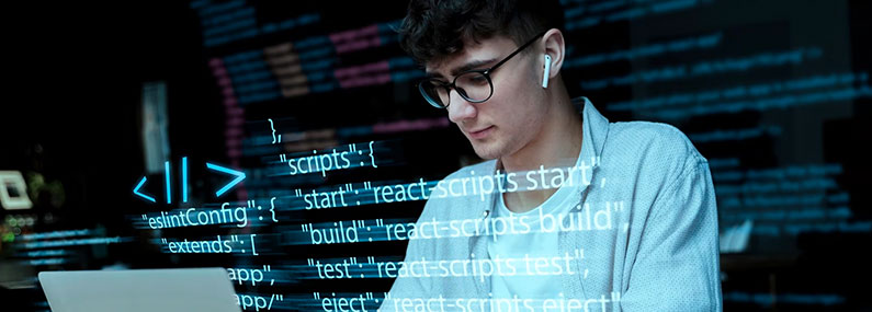 A close-up view of a testing engineer hand typing code on a keyboard. In the background, a computer screen displays complex code and a completed software program interface; concept of Top Software Test Engineer Jobs in July 2024