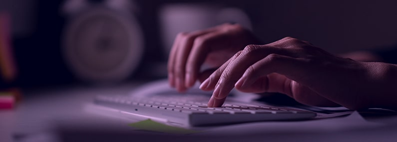 close up of fingers typing on keyboard, concept of data entry skills